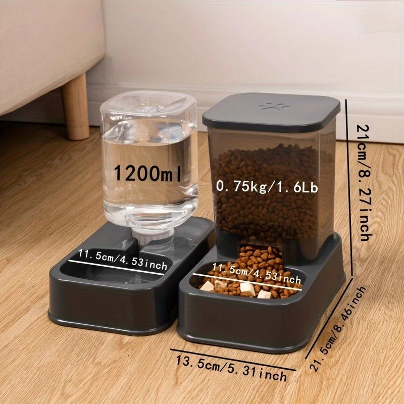 Grey automatic pet food and water dispenser set with transparent containers and dimension labels on a wooden floor.