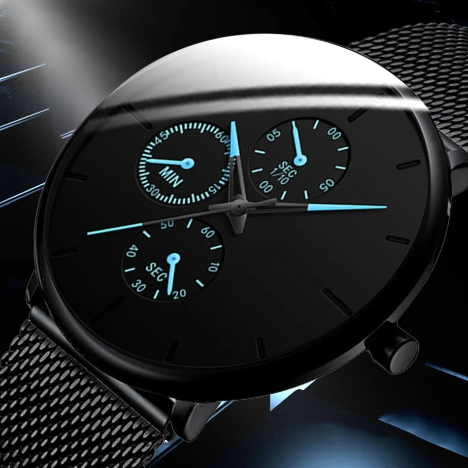 Ultra-thin black men's stainless steel watch with a mesh strap and three sub-dials featuring luminous blue detailing.