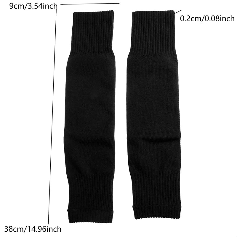 Pair of black knitted leg warmers with ribbed cuffs, measuring 38cm long and 9cm wide.
