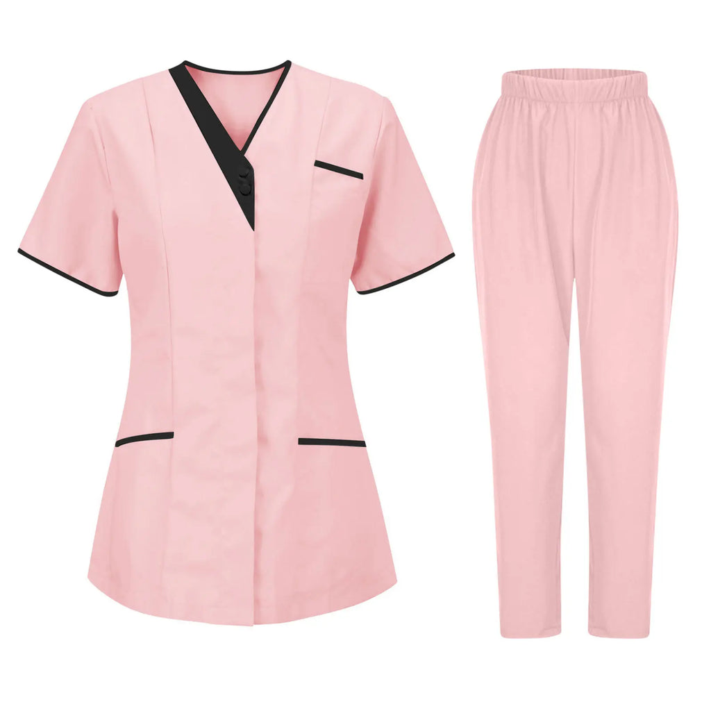 Women’s pale pink work uniform set featuring a V-neck tunic with black trim and matching elasticated trousers.