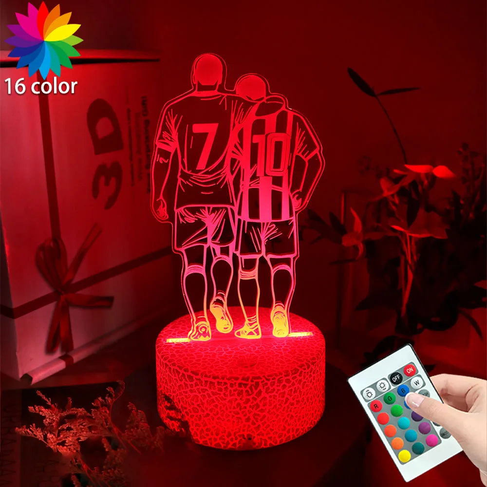 Red 3D LED lamp featuring two football players, with a remote control for 16 colour settings and light effects.