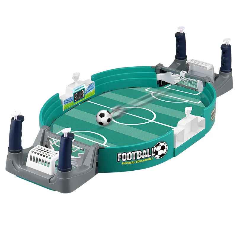 Tabletop football game in teal and grey with a motion-blurred ball, goal nets, and a digital score display.