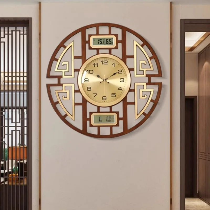 Modern round wall clock with a dark wood-finish geometric frame, gold clock face, and digital date and weather displays.