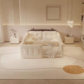 Cream-coloured parent-child bed with protective guardrails, playful cow-ear headboard details, and plush upholstery.