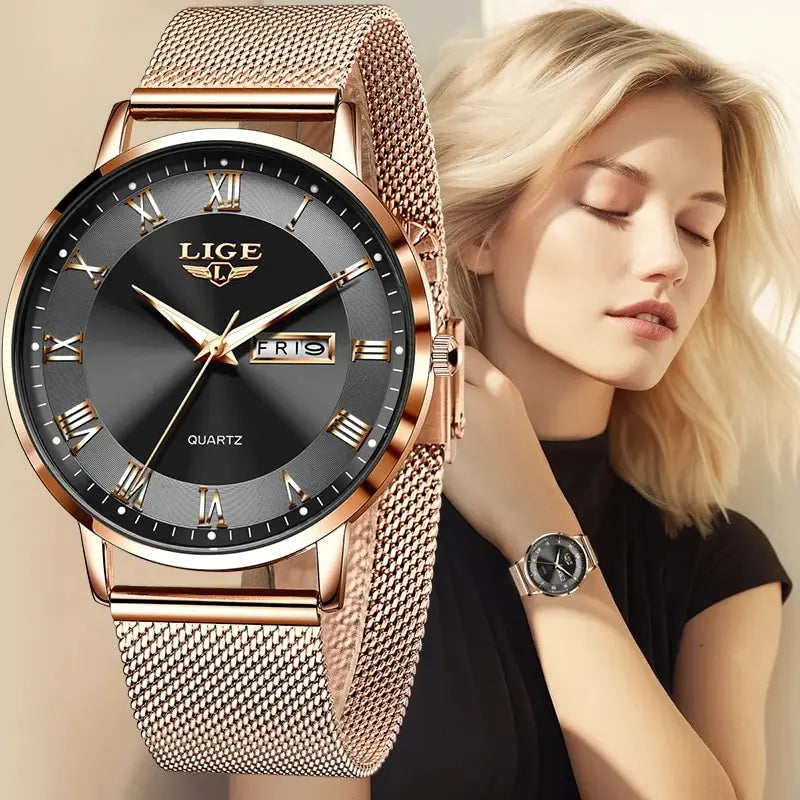 Elegant women's rose gold mesh bracelet watch featuring a black dial with Roman numeral markers and day-date display.