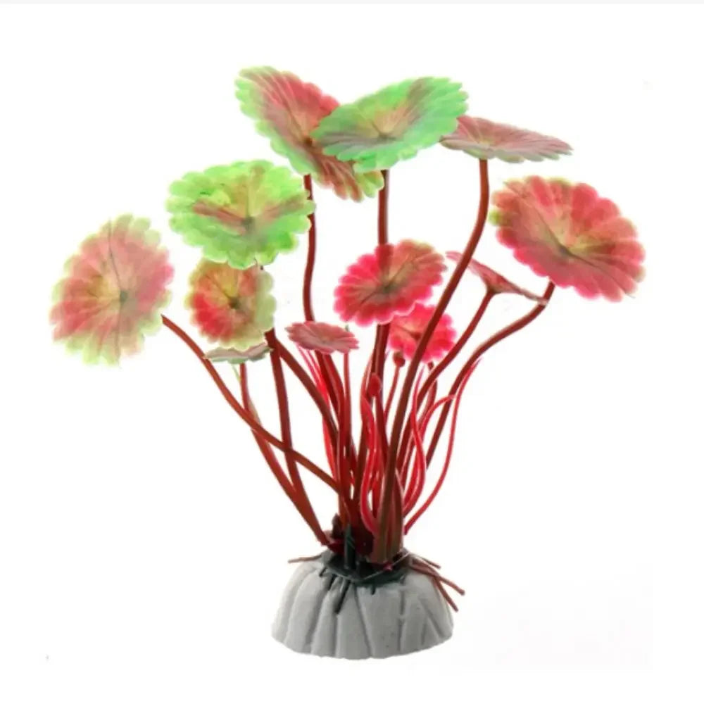 Artificial aquarium plant with red stems and round, variegated green and pink leaves on a grey weighted base.