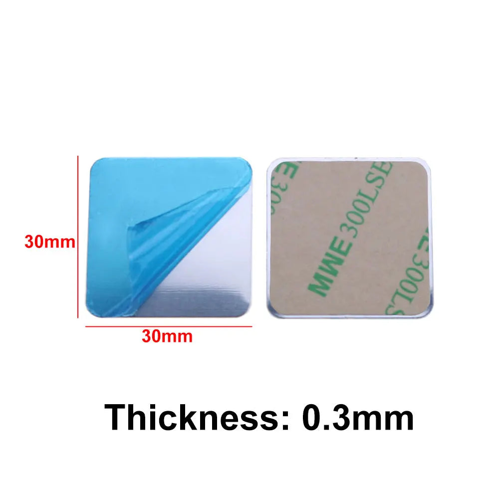 Two 30x30mm square adhesive metal plates, 0.3mm thick, one with blue peel-off backing and one with adhesive side.