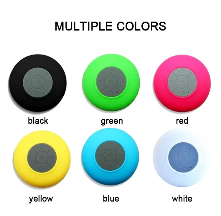 Six round, waterproof Bluetooth speakers in black, green, red, yellow, blue, and white, each with control buttons.