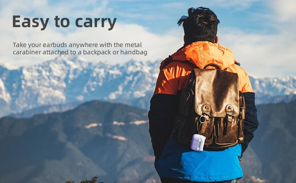 Lilac silicone AirPods Pro case with a metal carabiner, attached to a hiker’s leather backpack.