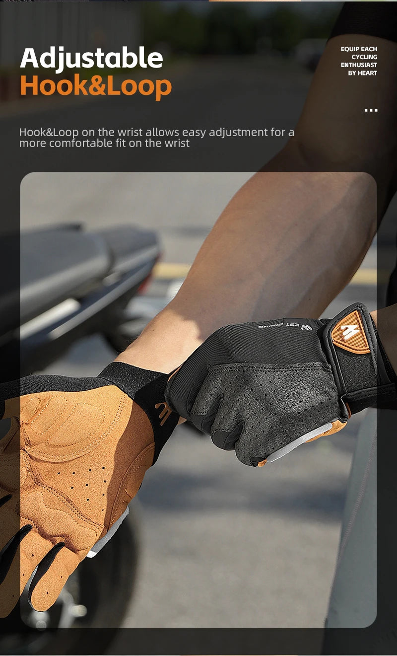 Black and tan fingerless cycling gloves with an adjustable hook-and-loop wrist strap, worn by a cyclist.