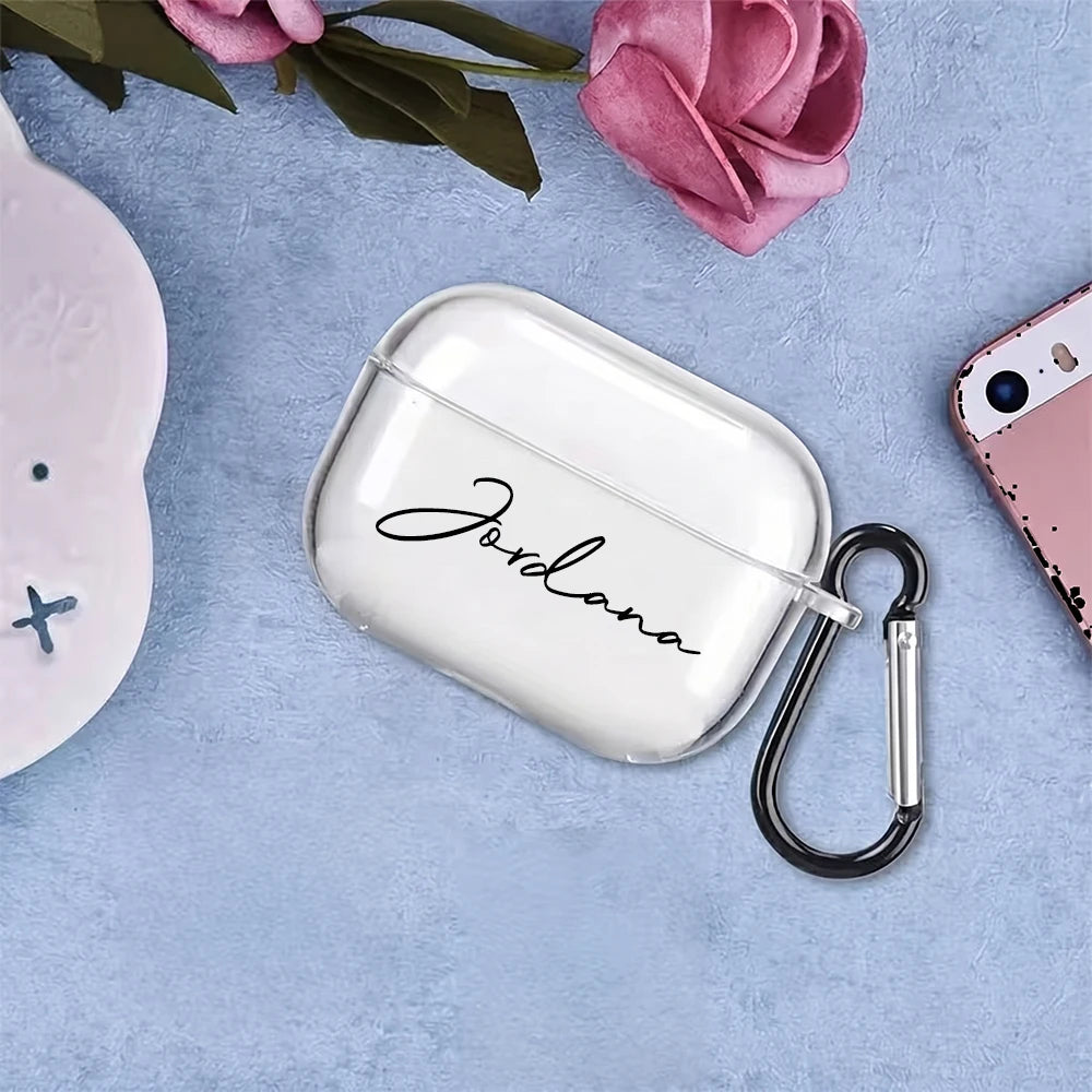 Personalised clear silicone AirPods Pro case with a black carabiner, featuring the name 'Jordana' in black script.