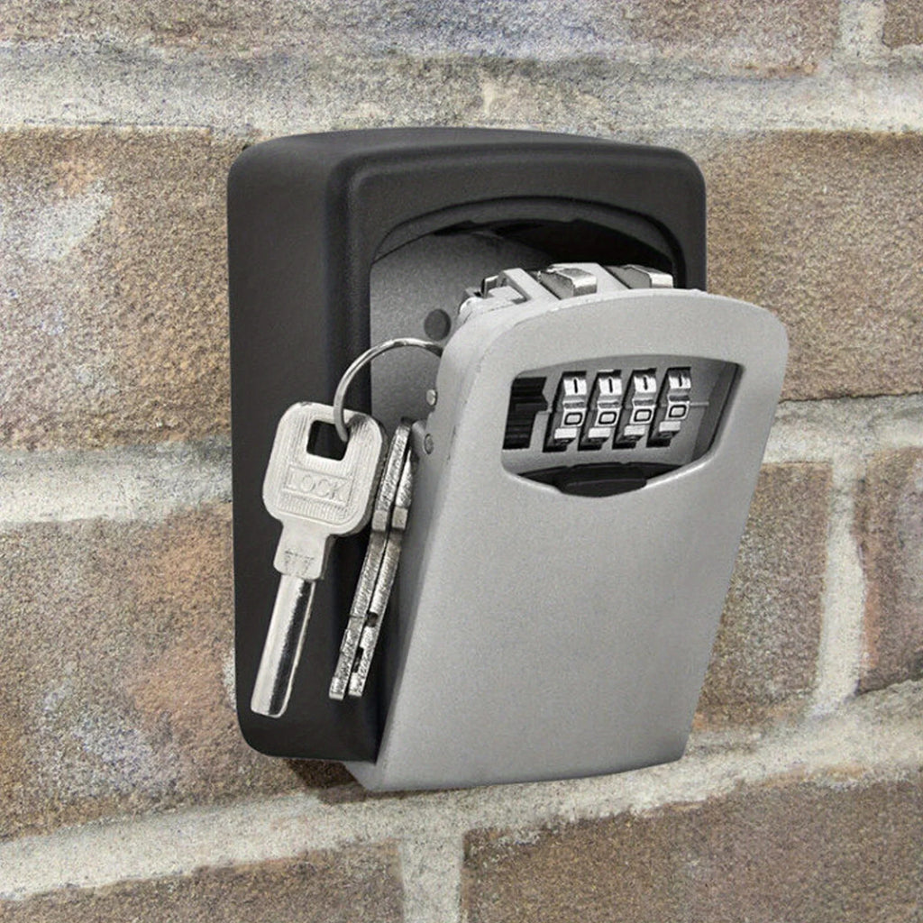 Black and silver metal wall-mounted key lock box with a four-digit combination dial, holding two metal keys.