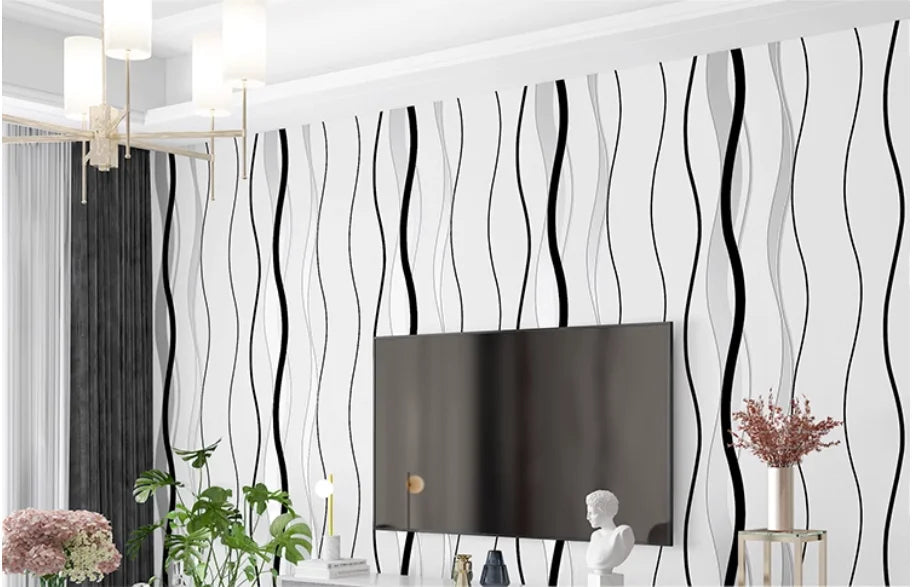 Nordic-style wallpaper featuring black and grey flowing vertical wavy stripes on a white background.