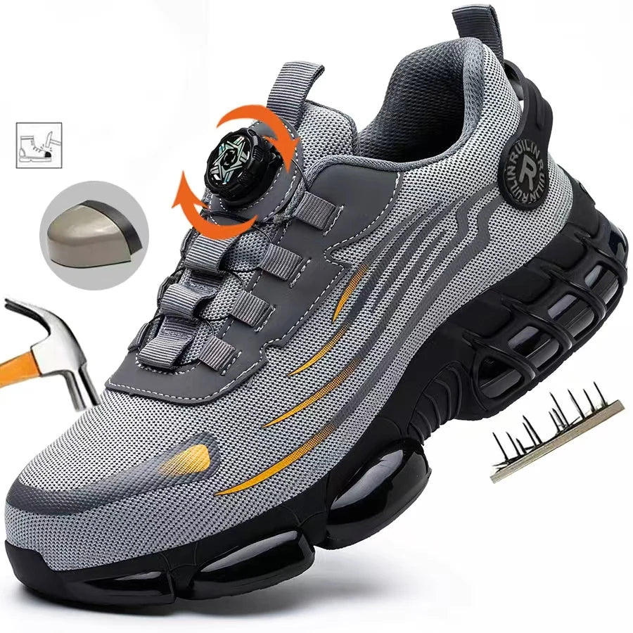 Grey steel-toe work trainer with a dial-fastening system, chunky black sole, and puncture-proof protection.