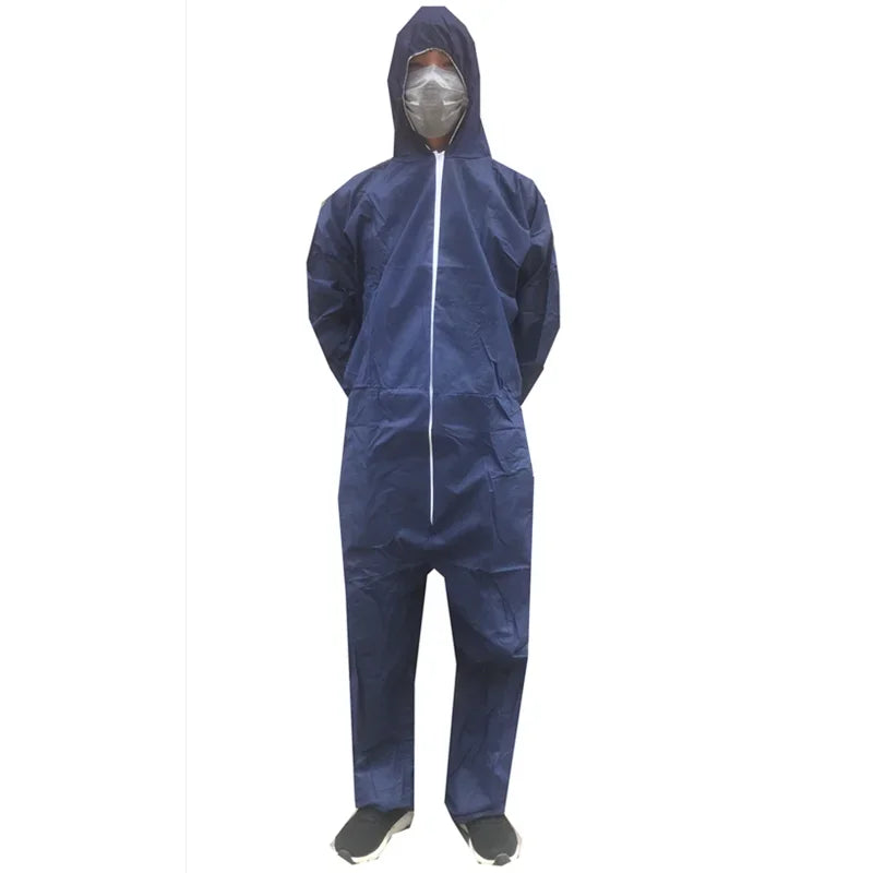Person wearing a dark blue, hooded, disposable non-woven protective coverall with a white front zipper.