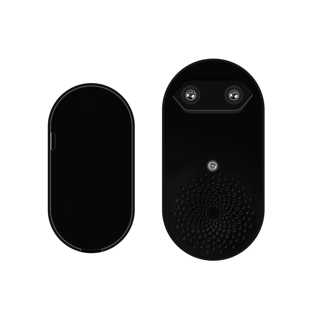 Sleek black oval wireless doorbell set. Includes a smooth push button and a plug-in chime unit with speaker grille.