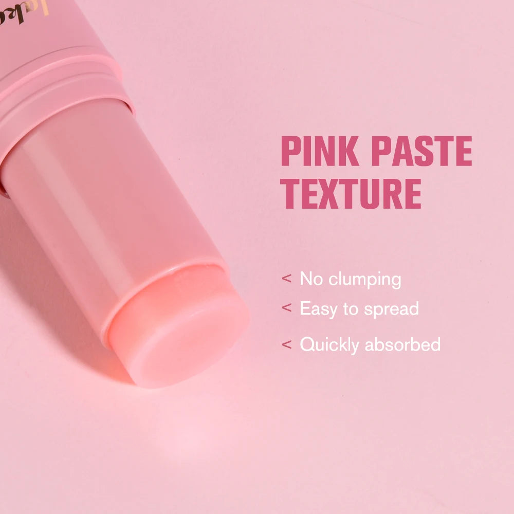 Pink cosmetic stick applicator, featuring a non-clumping, easy-to-spread, and quick-absorbing paste texture.