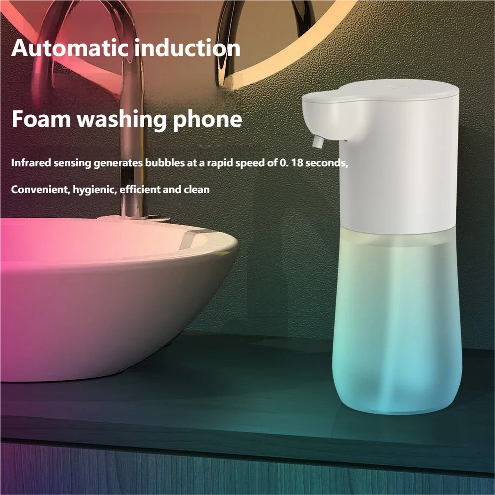 Modern white automatic foam soap dispenser with a frosted, colour-gradient base, standing on a bathroom counter.