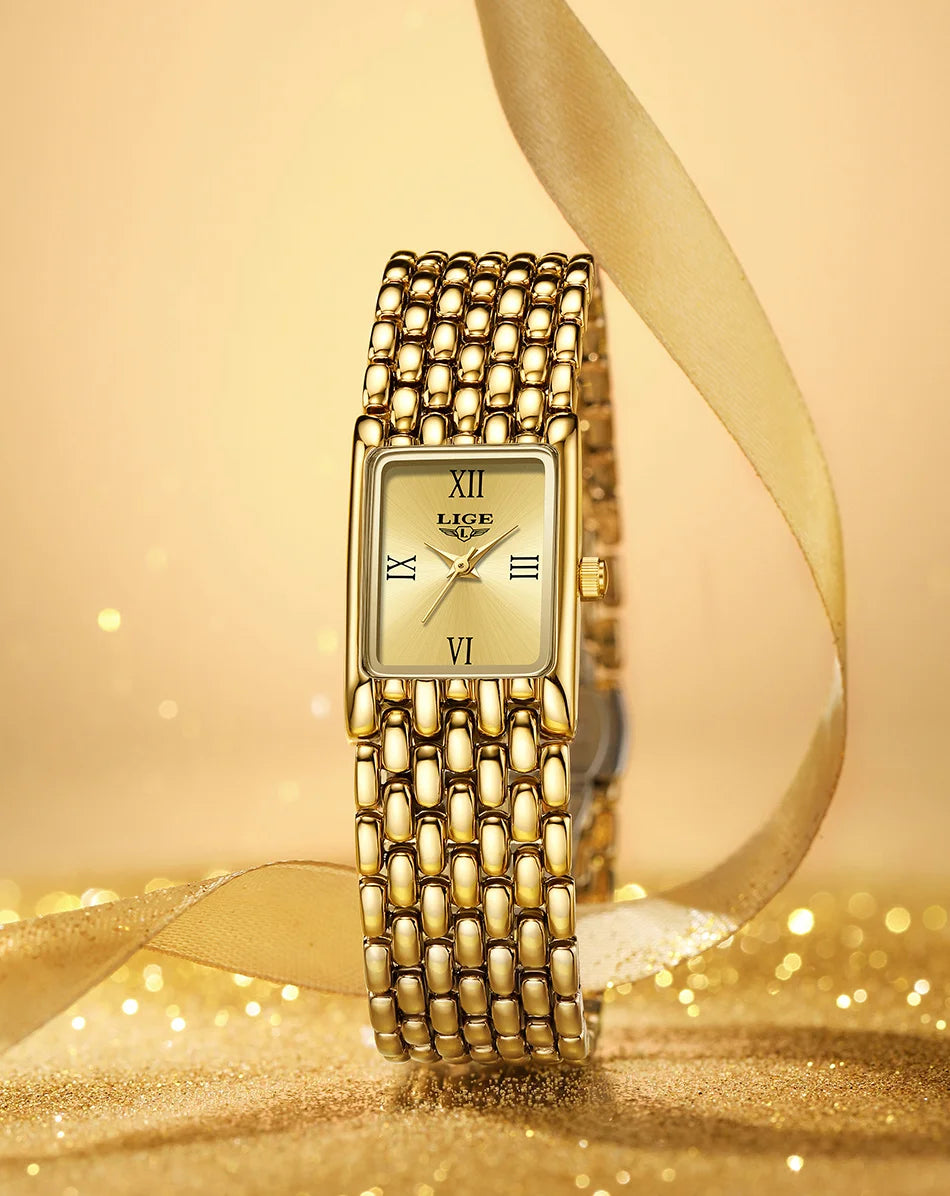 Luxury gold-tone women’s quartz watch with a square face, Roman numerals, and a polished stainless steel link strap.