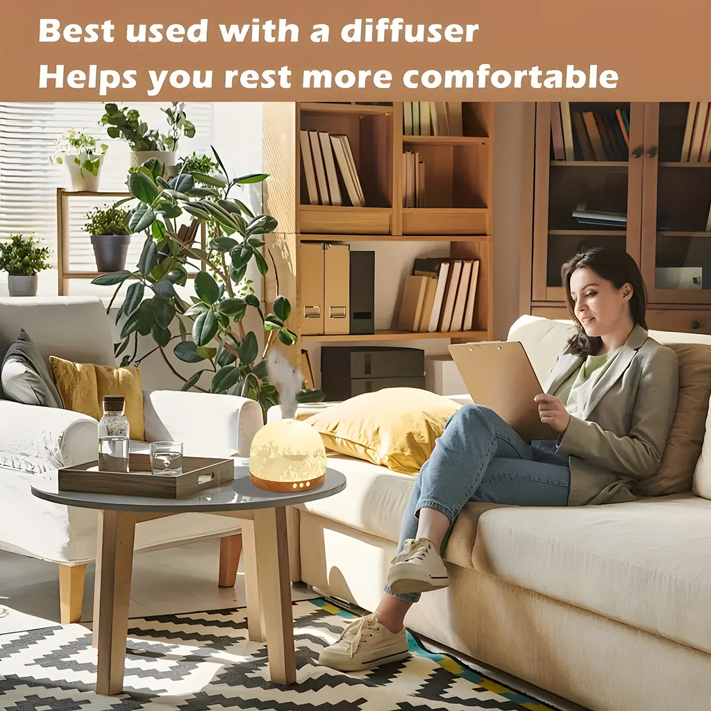 Dome-shaped wooden aromatherapy diffuser emitting mist on a living room table, creating a calm, cozy atmosphere.