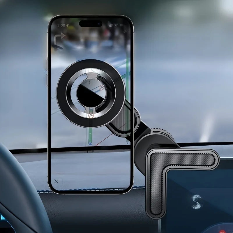 Black magnetic car phone mount attached to a dashboard with a smartphone displaying navigation.