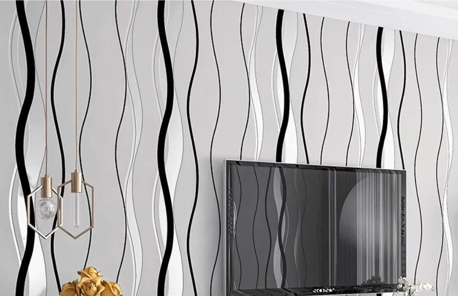 Modern wallpaper featuring a monochrome wave pattern of vertical black and grey stripes on a light grey background.