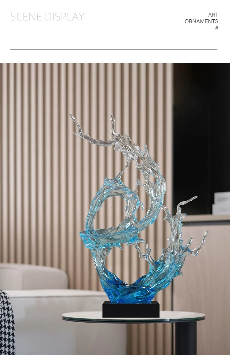 Modern abstract resin ornament featuring a dynamic, translucent blue and clear water-splash design on a black base.