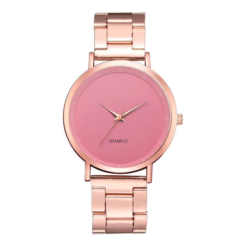Ladies' rose gold stainless steel watch with a minimalist pink dial and link bracelet strap.