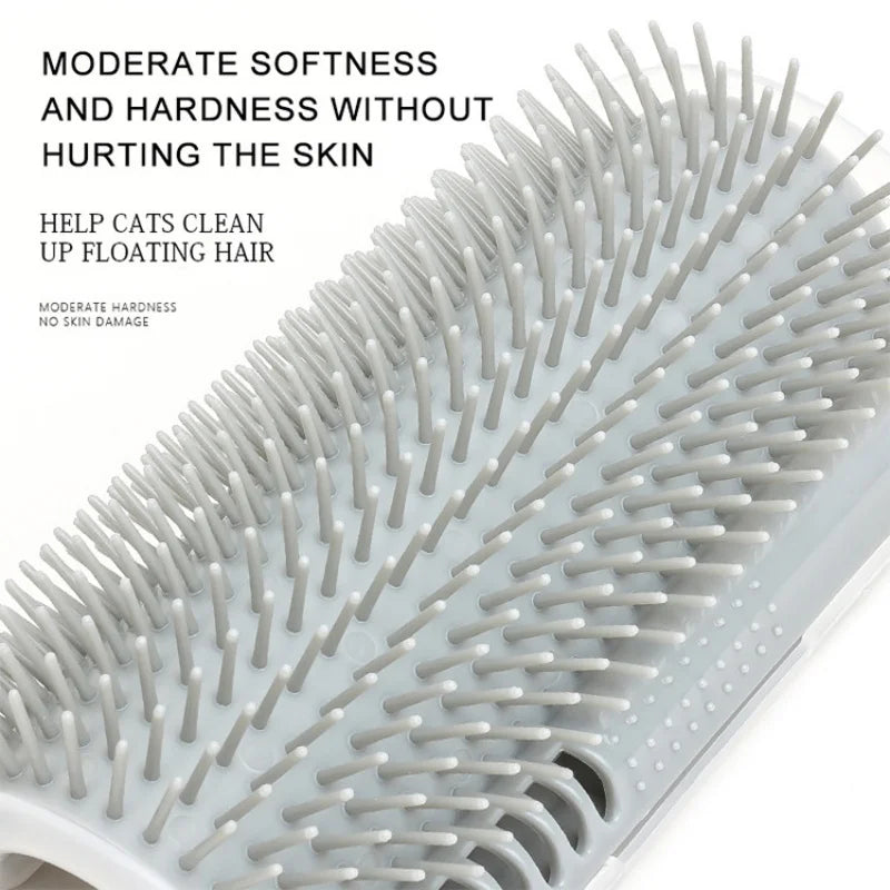 Grey silicone cat grooming brush with soft, dense bristles for removing loose fur.