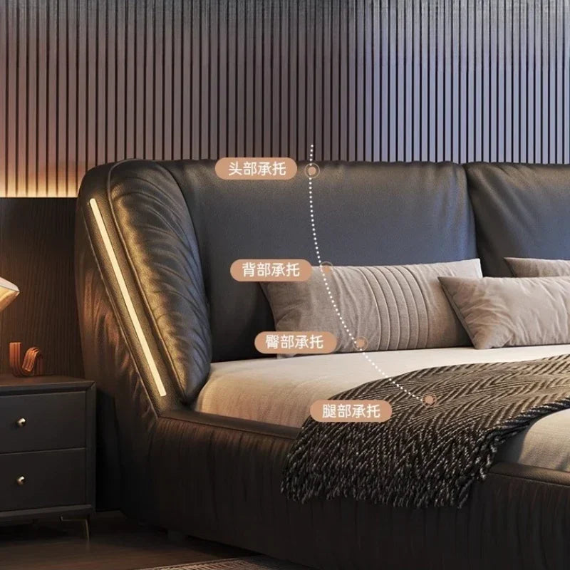 Modern king-size upholstered bed frame in black with integrated LED lighting and ergonomic headboard design.