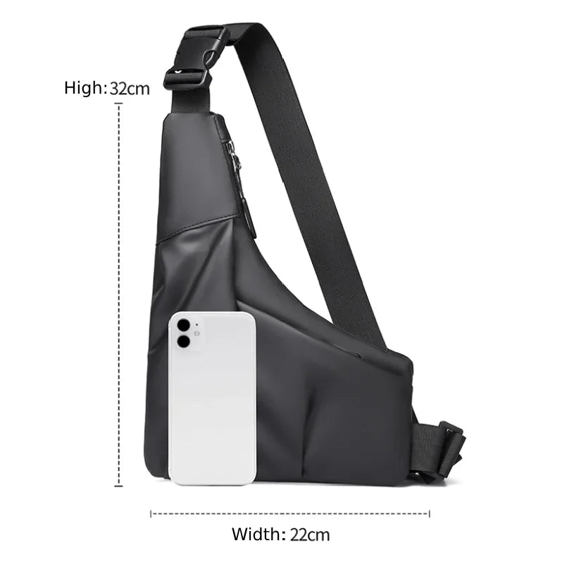 A sleek black triangle crossbody chest bag with an adjustable strap and white smartphone for size reference.