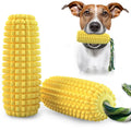 Yellow corn-shaped TPR dog chew toy with a textured surface and green cotton rope handle.