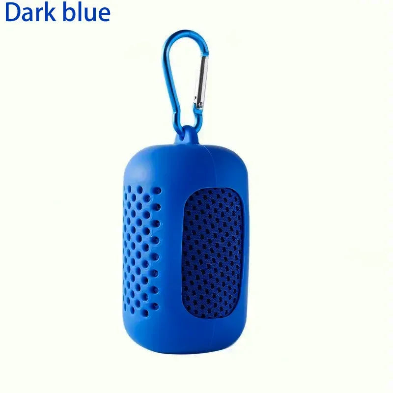 Dark blue portable storage case with mesh sides and a silver carabiner clip for attachment.