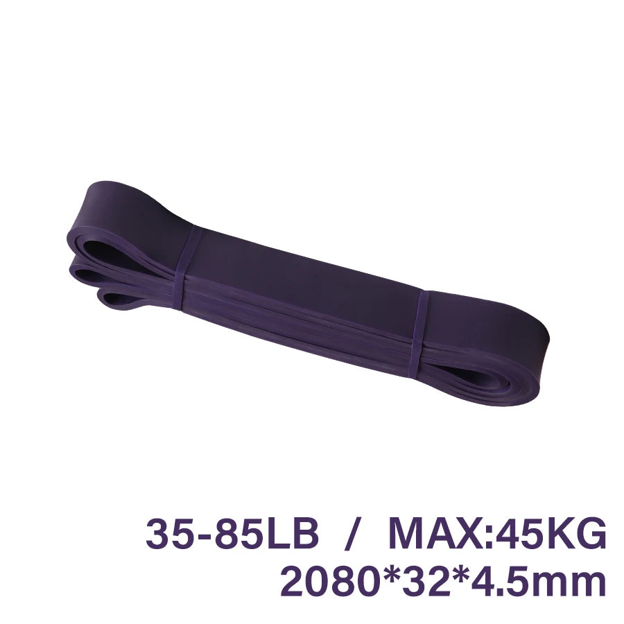 A thick, purple exercise resistance band looped into a flat, folded shape against a white background.