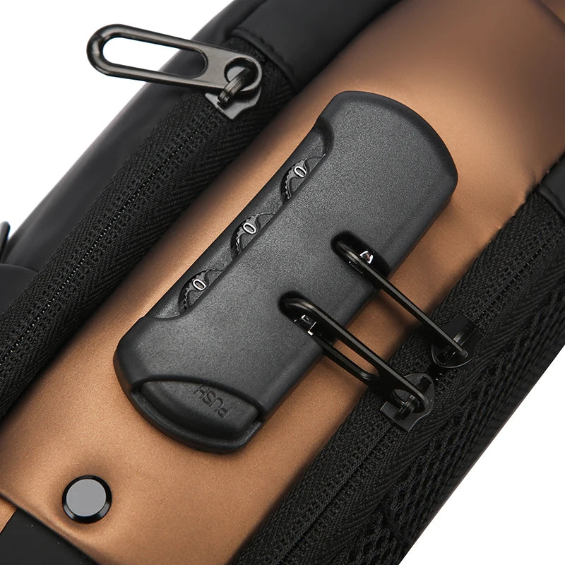 Close-up of a black and bronze anti-theft crossbody bag with a secure three-digit combination lock and zip fastening.