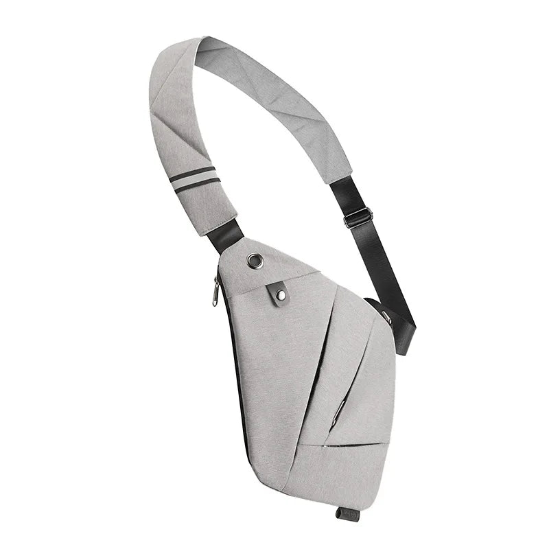 Light grey, slimline anti-theft crossbody bag with an adjustable strap and secure zip compartments.