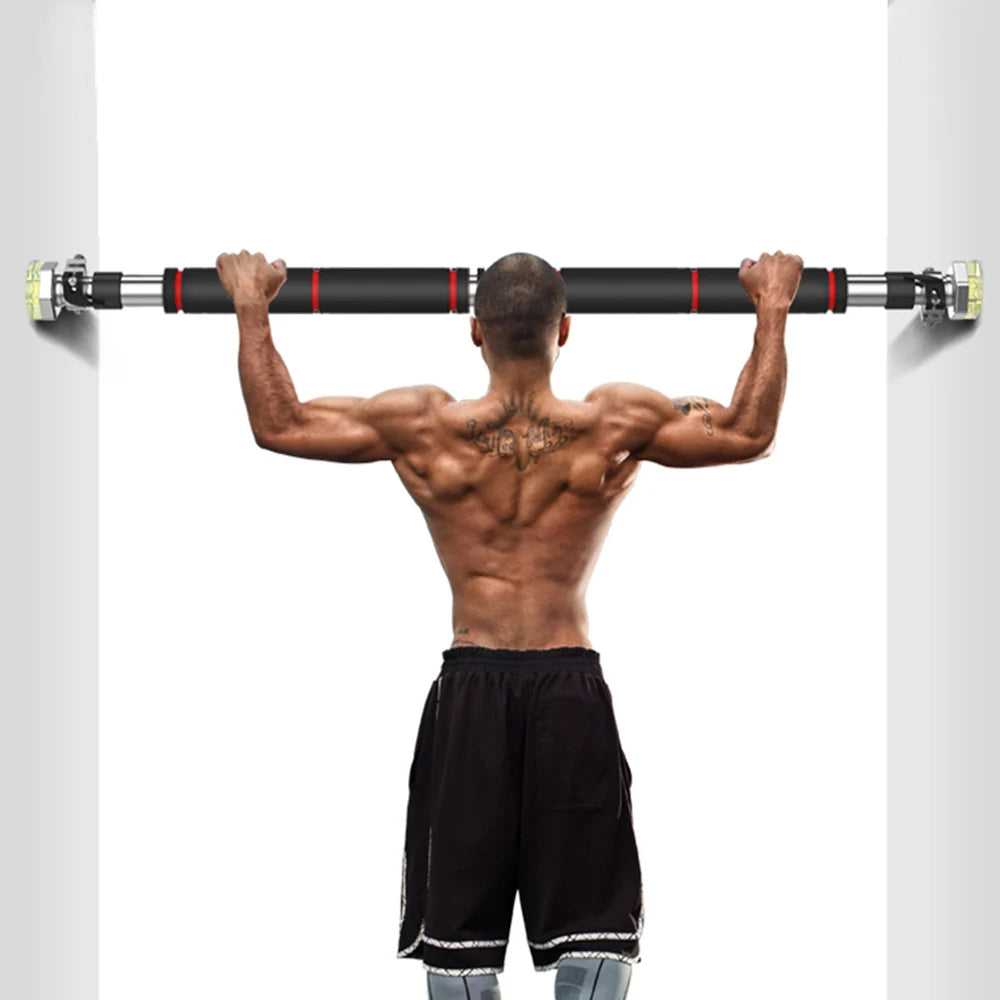 Black and silver pull-up bar mounted in a doorway, featuring black foam grips and secure end pads.