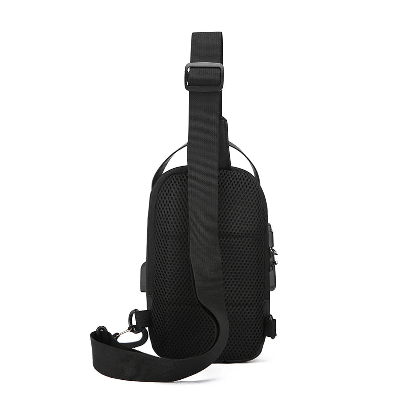 Back view of a black crossbody chest bag with an adjustable strap and breathable mesh padded backing.