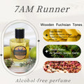 Clear glass perfume bottle with gold liquid, black cap, and label, featuring citrus, fir, and woody fragrance notes.