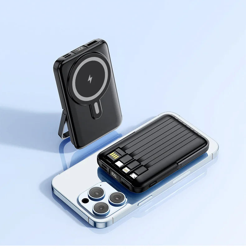 Black 20,000mAh magnetic power bank with integrated cables and foldable stand, shown charging a smartphone.