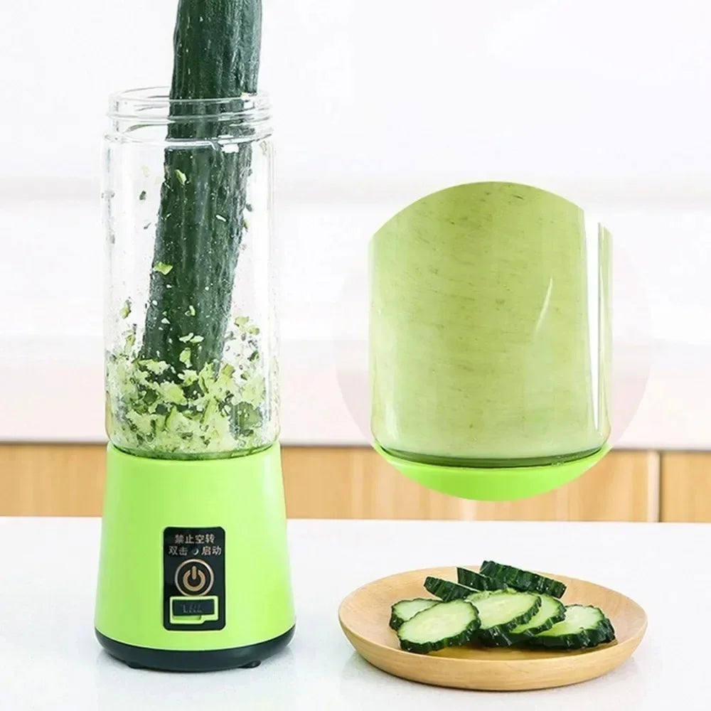 Lime green portable electric blender with a clear canister, shown blending a cucumber next to a plate of slices.