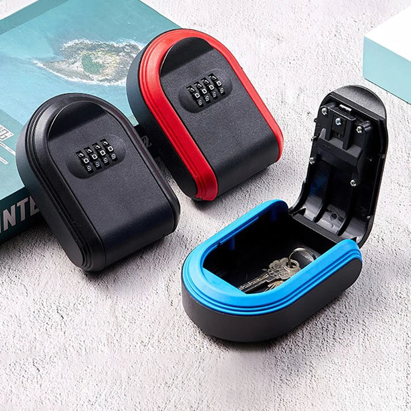 Three black plastic portable key lock boxes with red, blue, and black trim and four-digit combination dials.