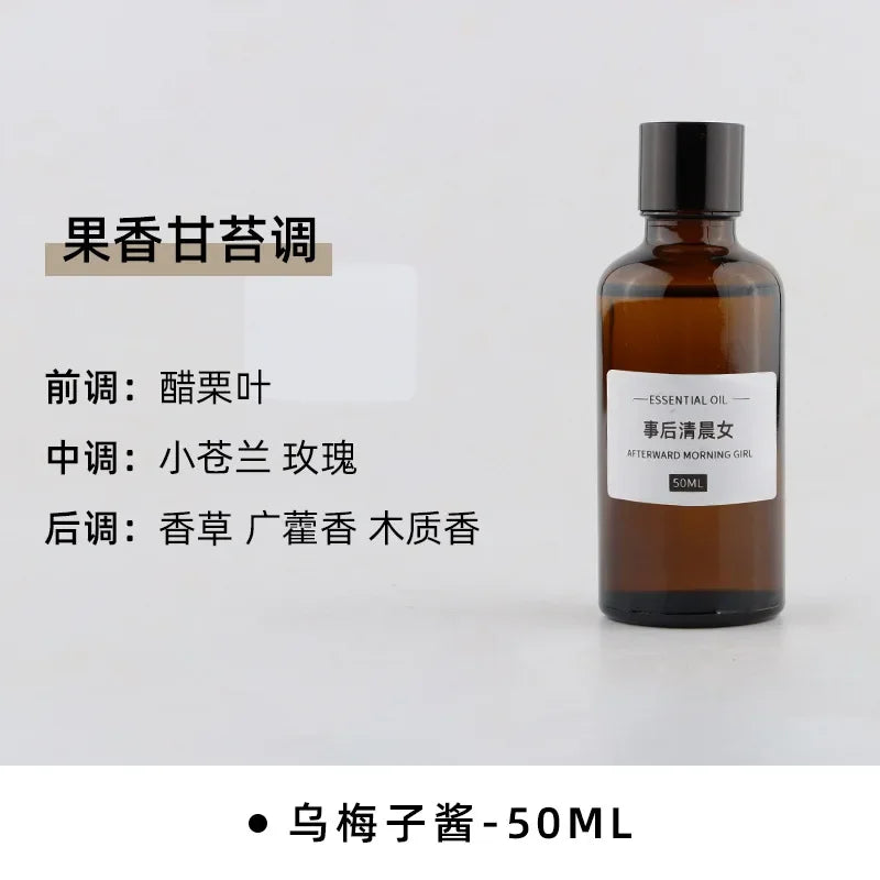 50ml amber glass essential oil bottle with a minimalist white label and black cap.