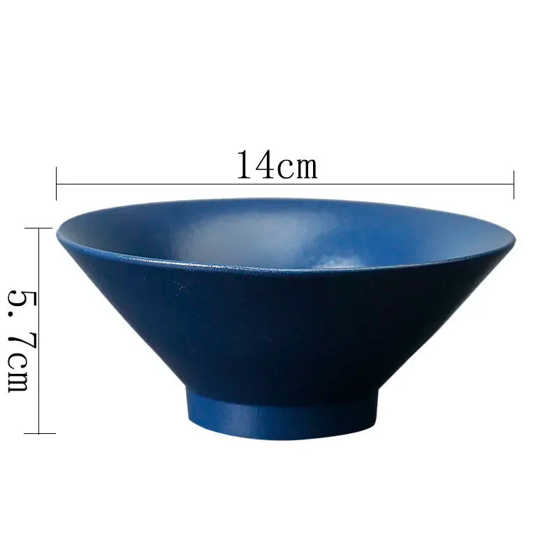 Deep blue ceramic bowl with a minimalist, conical design. Measures 14cm wide and 5.7cm high.