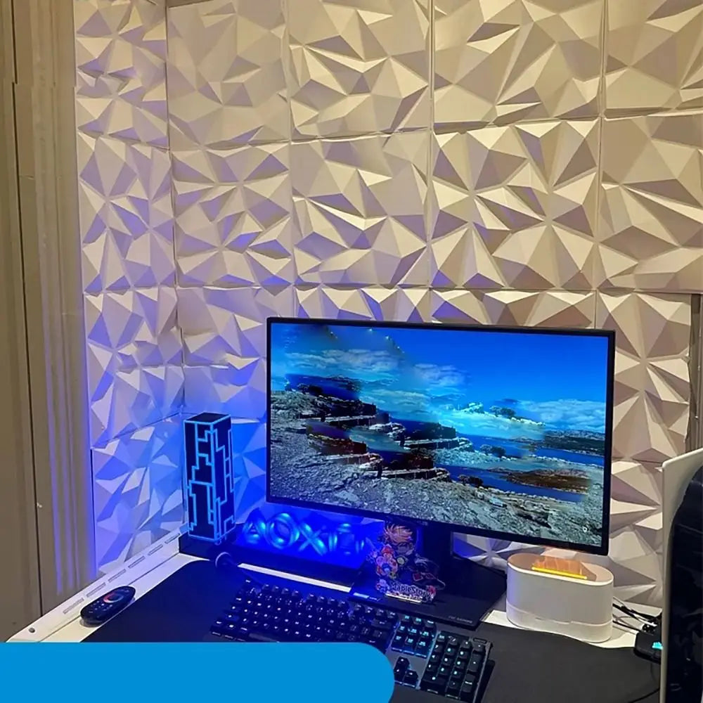 White 3D diamond-patterned wall panels, creating a modern, textured feature wall in a gaming room setup.