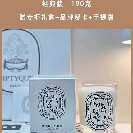 190g scented candle in a glass jar, featuring a white box, gift bag, and greeting card. Elegant, classic design.