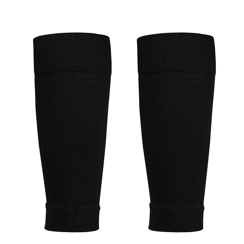 A pair of plain black calf compression sleeves with a ribbed elastic top band for a secure fit.