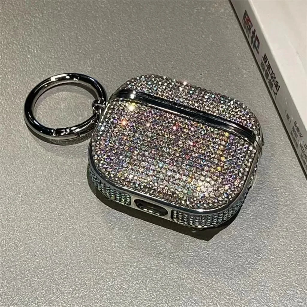 Silver sparkly crystal-encrusted AirPods Pro case with a matching keyring attachment.