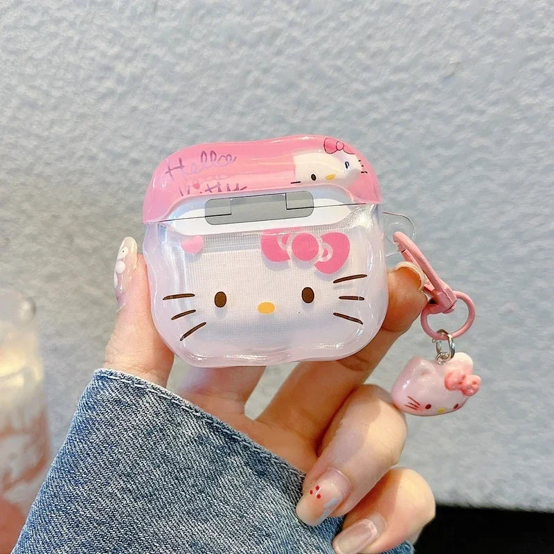 Pink Hello Kitty transparent AirPods case with matching charm, compatible with standard Apple AirPods models.