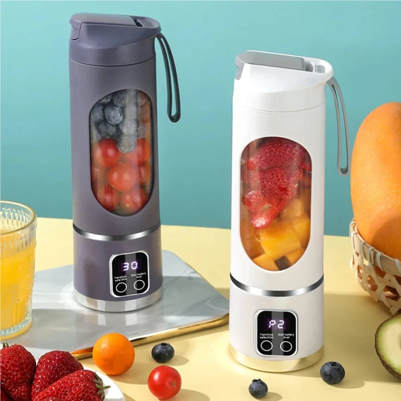 Two portable, cylindrical personal blenders in grey and white, each featuring a digital display and carry strap.